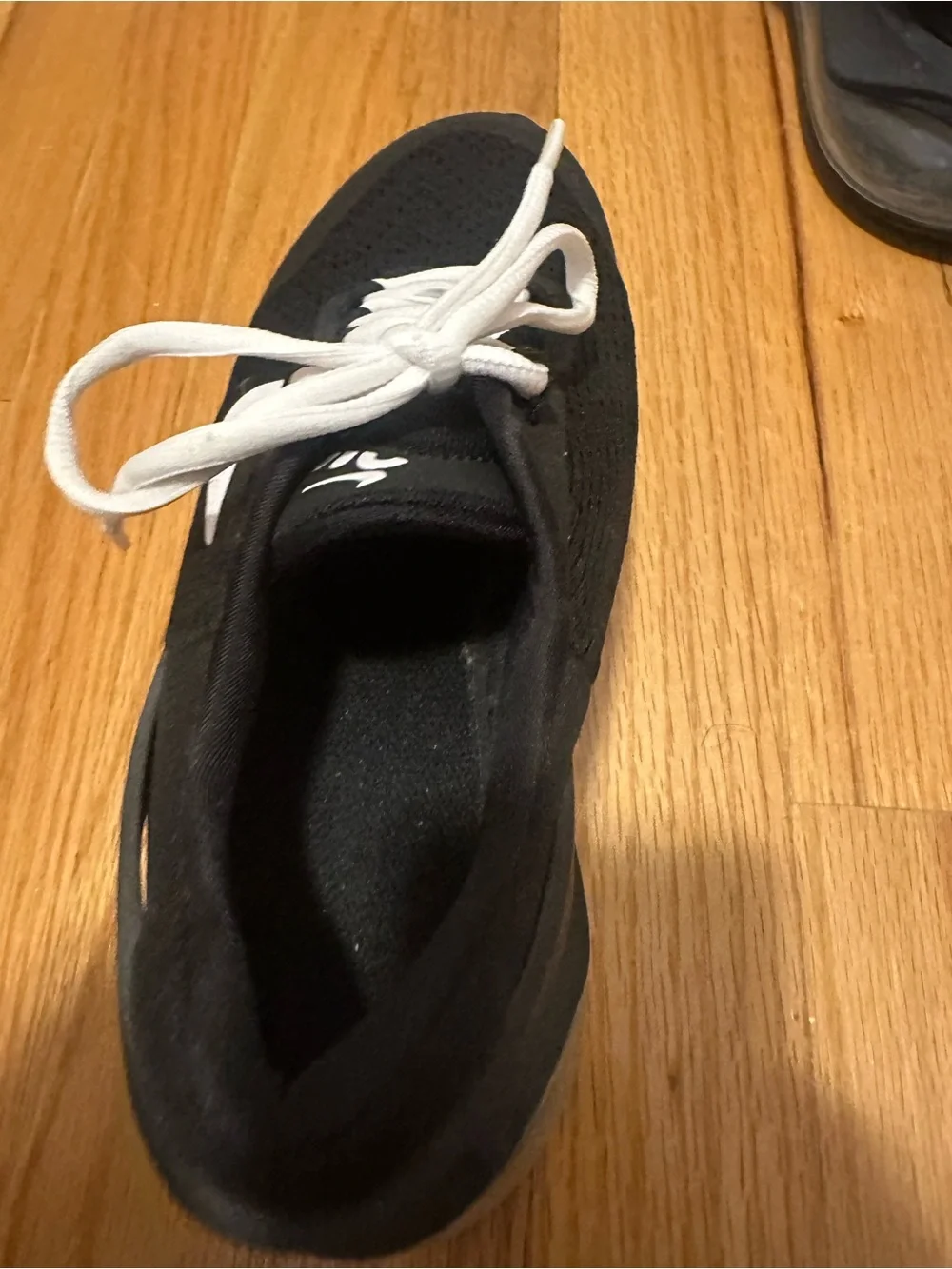 Nike women’s Black and White Sneakers